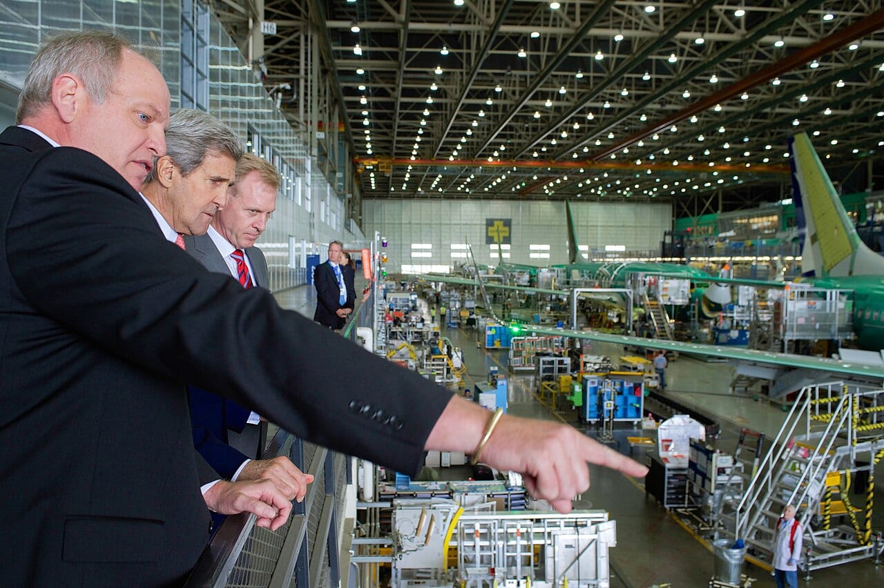 Boeing officials show U.S. Secretary of State John Kerry the 737 assembly line at the Renton, Washington plant