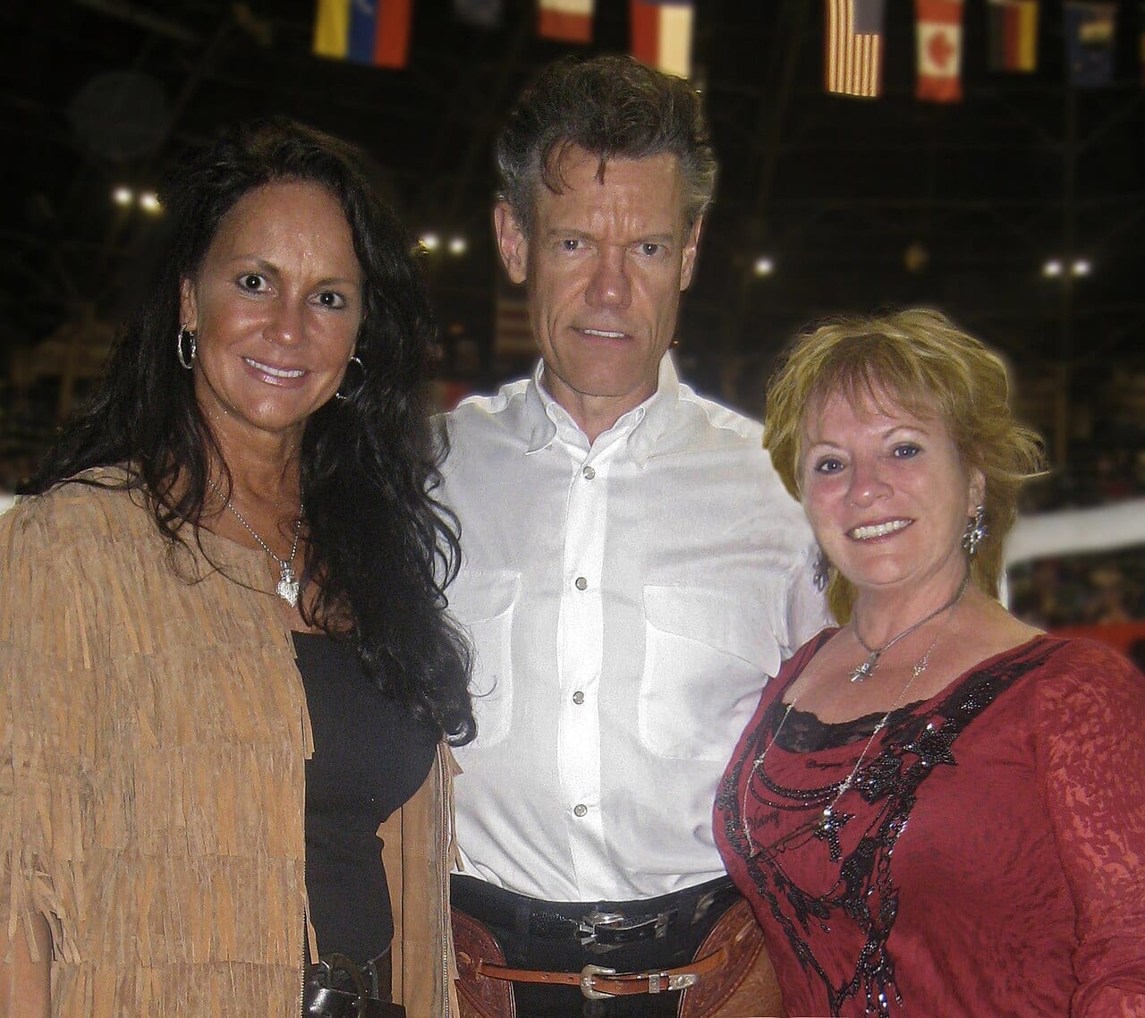 Randy Travis performs at a 2010 cutting-horse event, three years before a stroke took most of his singing voice