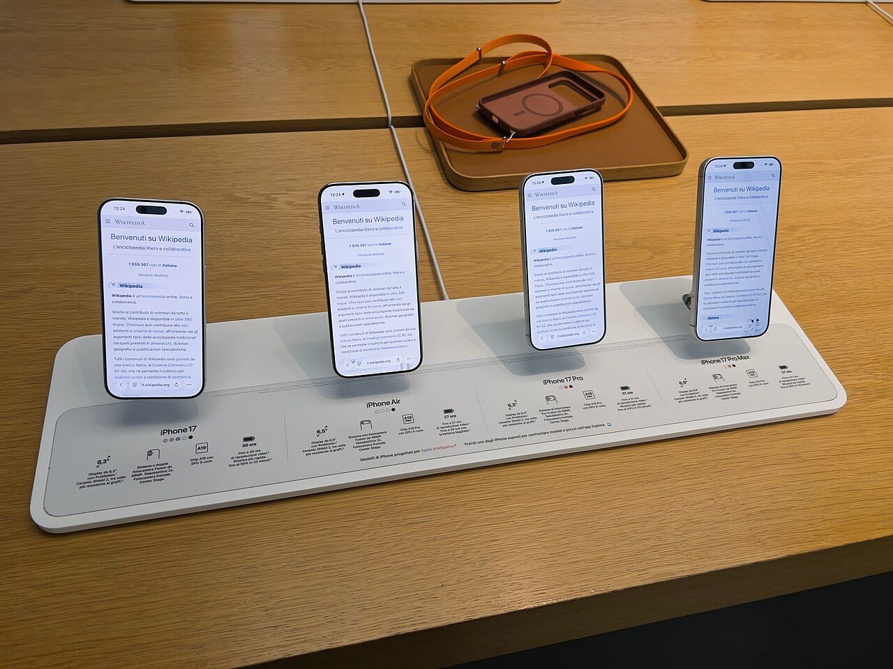 Four iPhone models lined up side by side