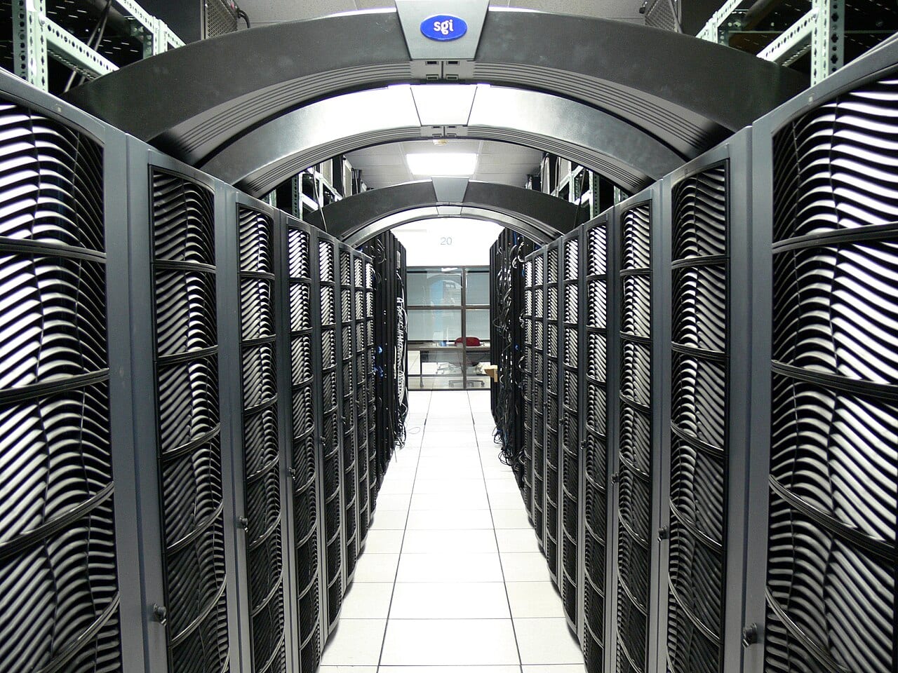 Rows of server racks inside a university data center