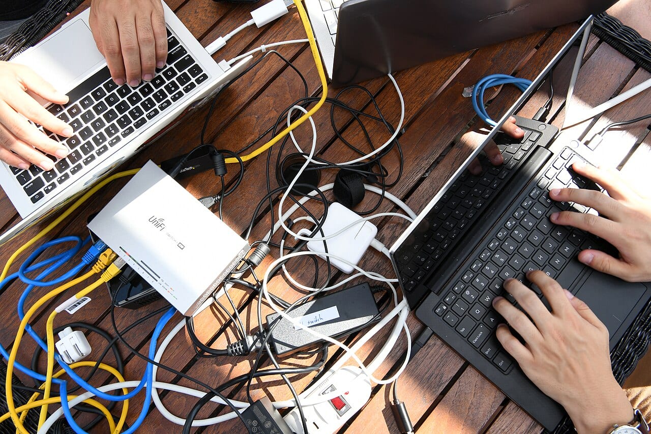 Air Force cyber warfare operators set up computer stations for a capture-the-flag competition at the DEF CON hacking conference in 2019