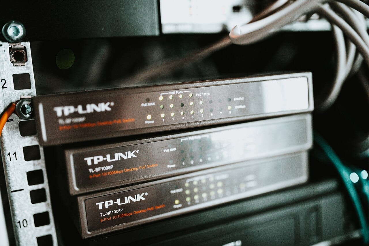 Network switches with status lights inside a data center server rack