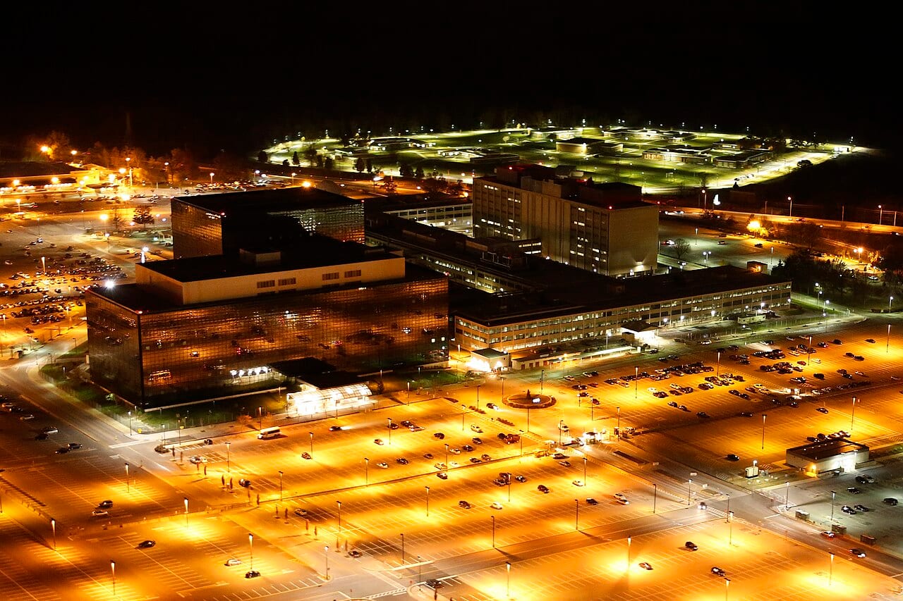 An aerial photograph of the National Security Agency headquarters at Fort Meade, Maryland, taken at night in 2013