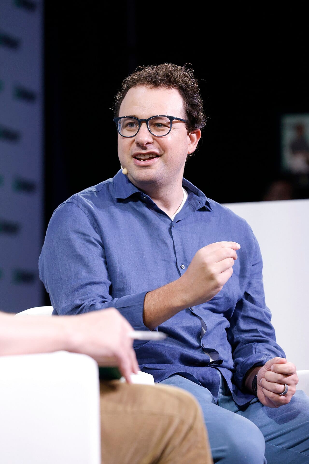 Dario Amodei speaks on stage at TechCrunch Disrupt in 2023