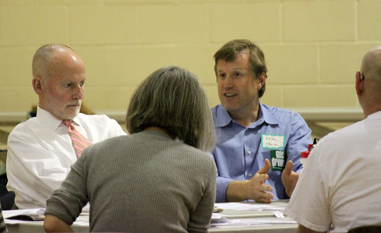 Seattle City Council members talk with residents about a city budget at a 2011 public meeting