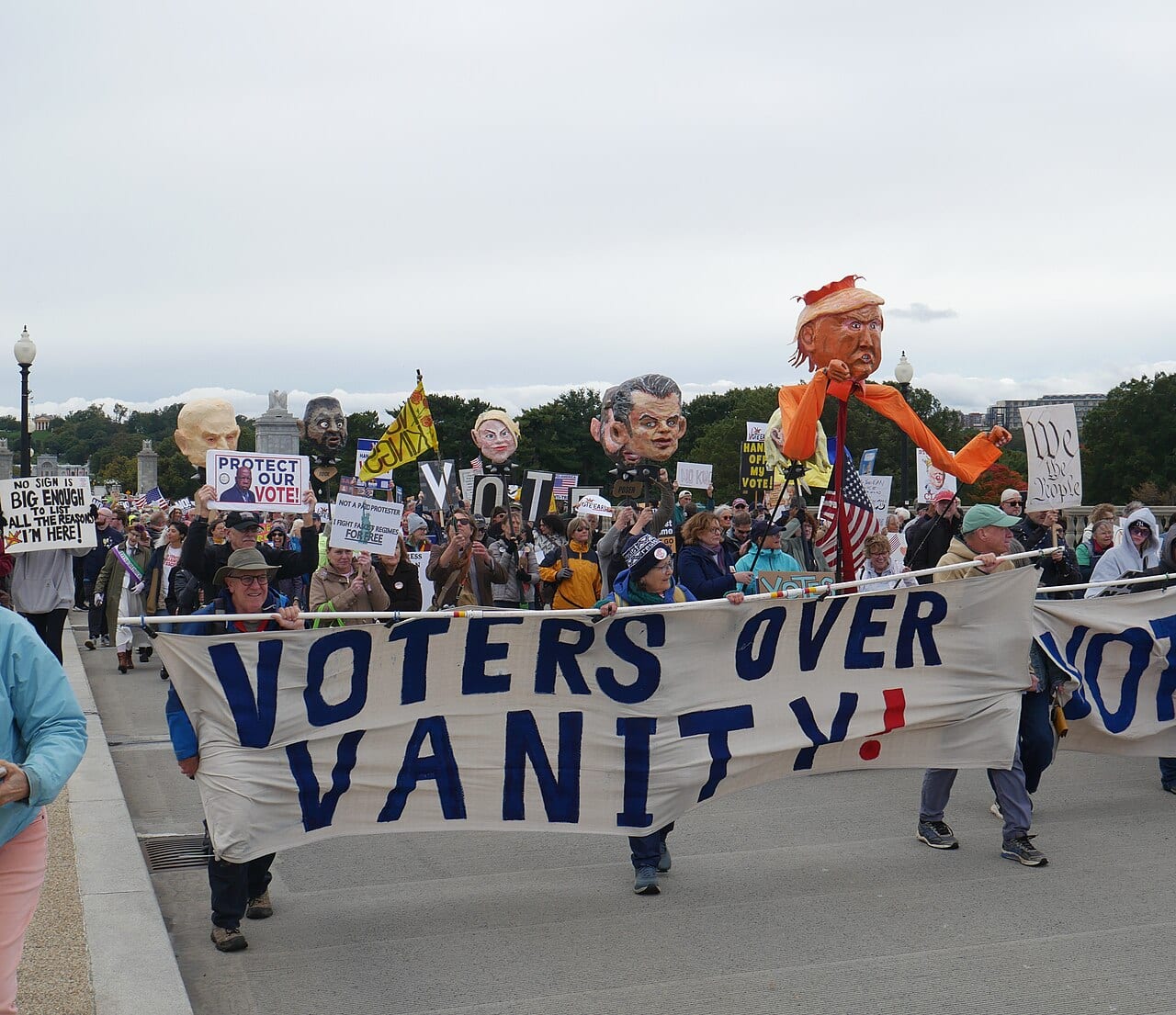 Crowds fill a downtown street in Washington, D.C., during nationwide protests on Oct. 17, 2026