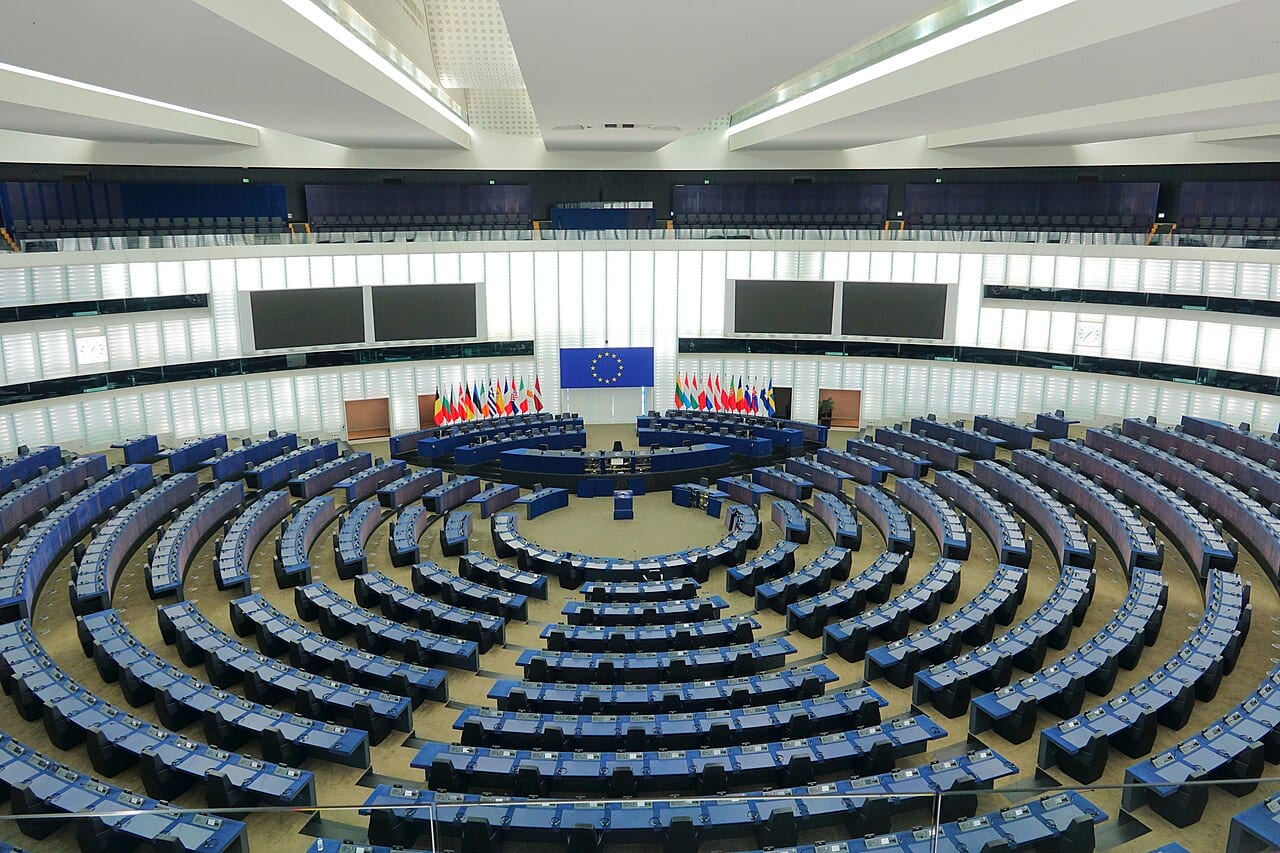 The hemicycle of the European Parliament in Strasbourg, which passed the AI Act that now requires labels on AI-made images, audio and video