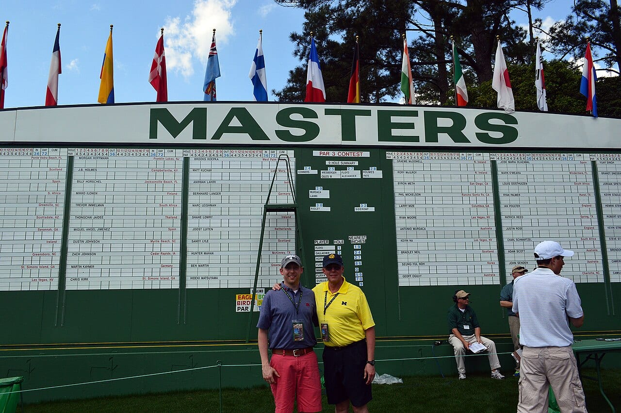 A tournament leaderboard listing golfers and their scores