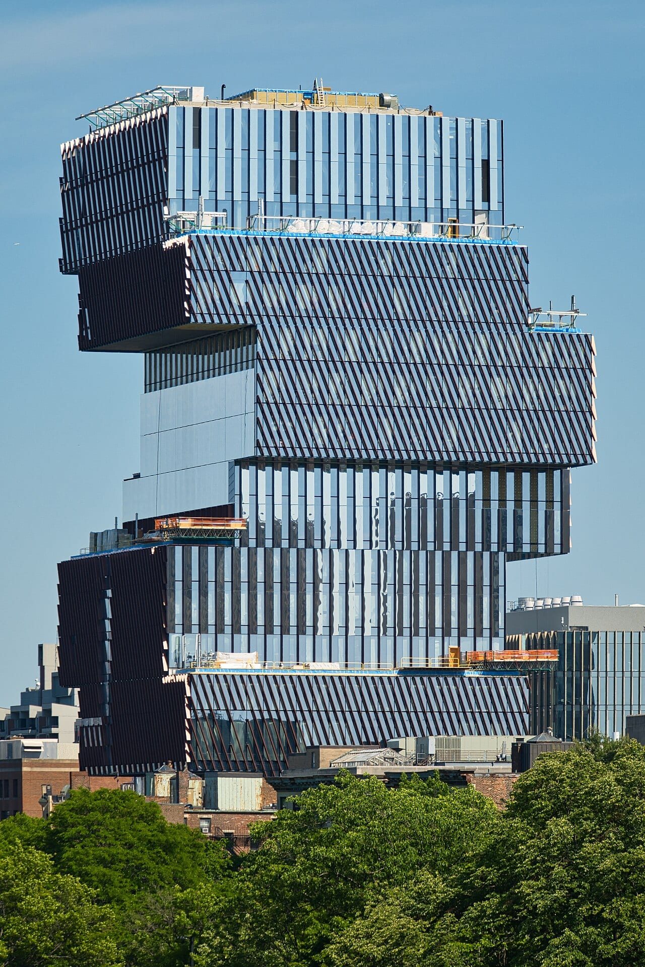 A data center building nearing completion, scaffolding still visible on one side