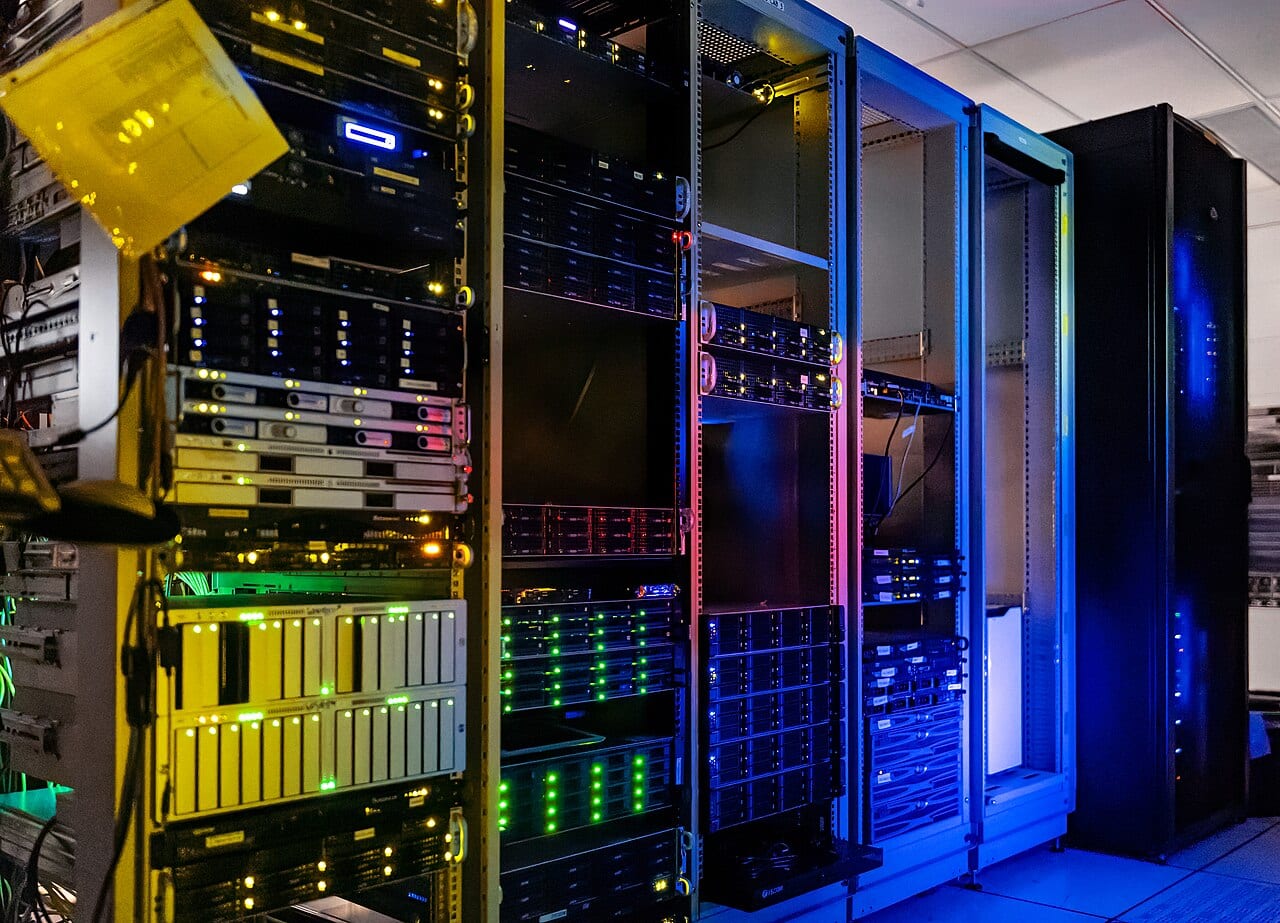 Server racks in a computer room, the kind of hardware behind a large AI training run