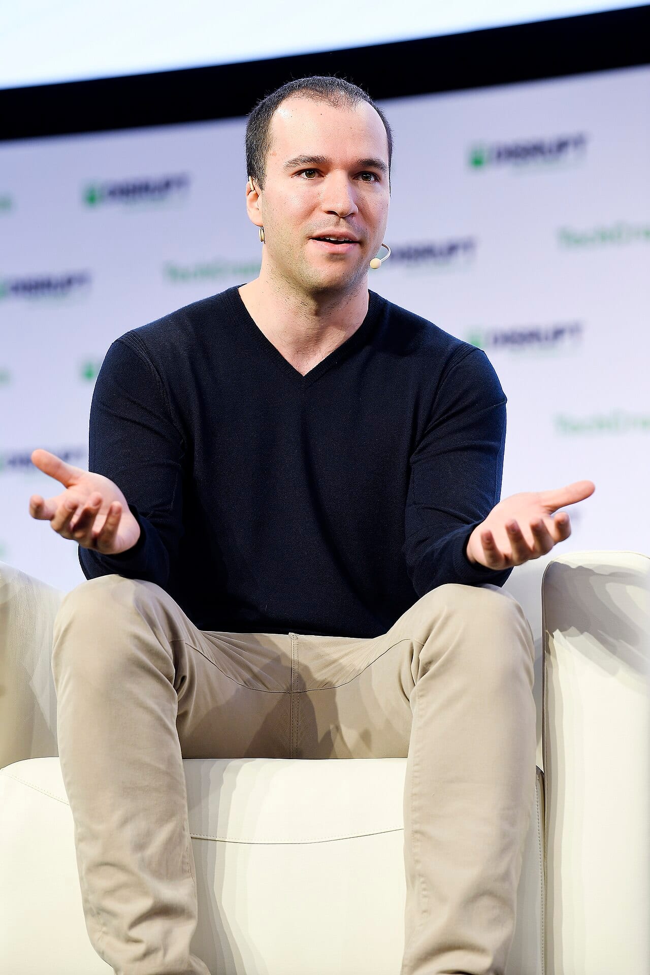 Greg Brockman, OpenAI's co-founder and president, speaks on stage at a conference