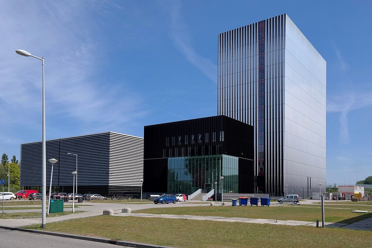 Equinix's AM3 and AM4 data center buildings rise against the sky in Amsterdam