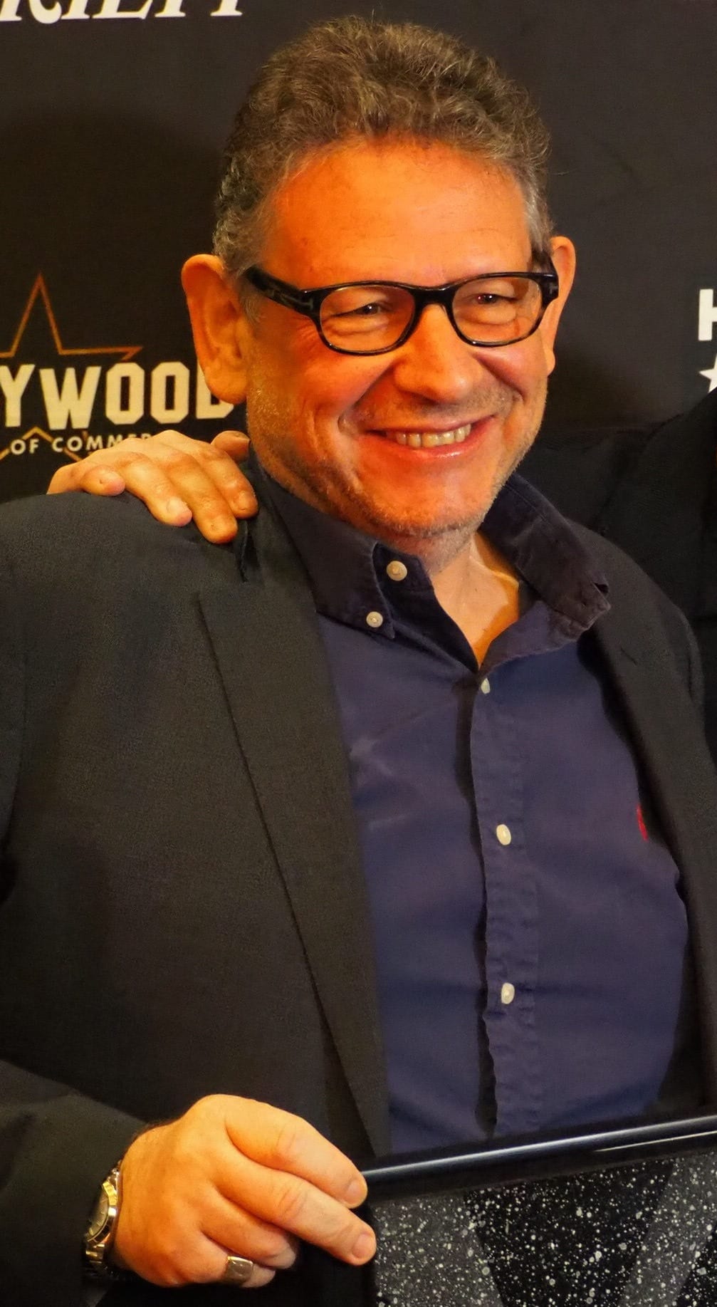 Lucian Grainge speaking at a 2018 industry event