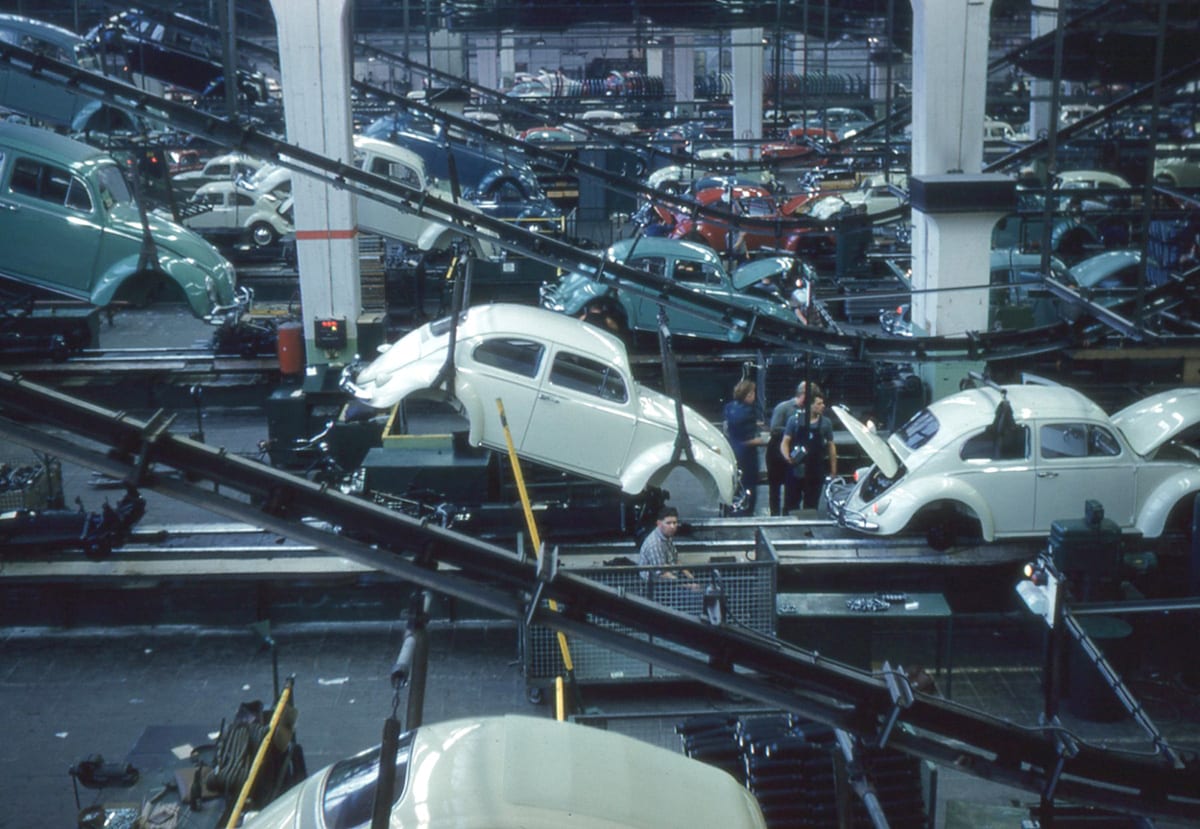 Workers on the assembly line inside a Volkswagen plant in Wolfsburg, Germany