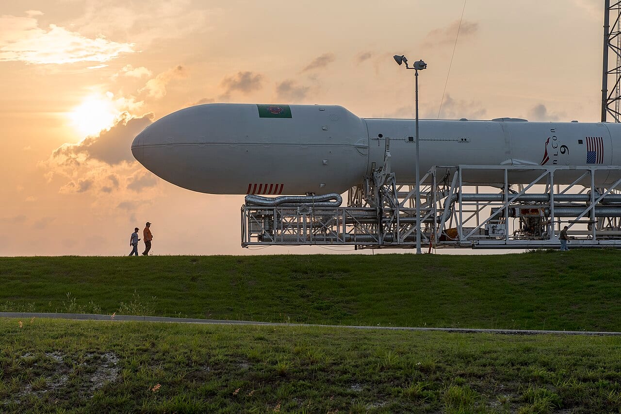A SpaceX Falcon 9 rocket rolled out to its launch pad at Cape Canaveral